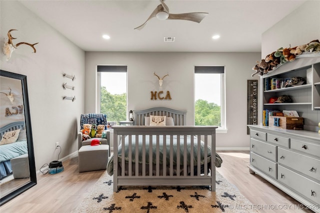 8562 Adams Creek Rd, Beggs, OK 74421 - bedroom with light wood-style floors, recessed lighting, baseboards, and ceiling fan
