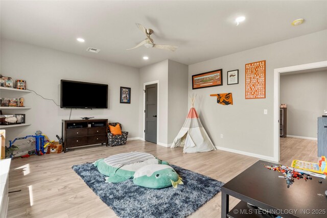 8562 Adams Creek Rd, Beggs, OK 74421 - living room with a ceiling fan, wood finished floors, baseboards, and recessed lighting