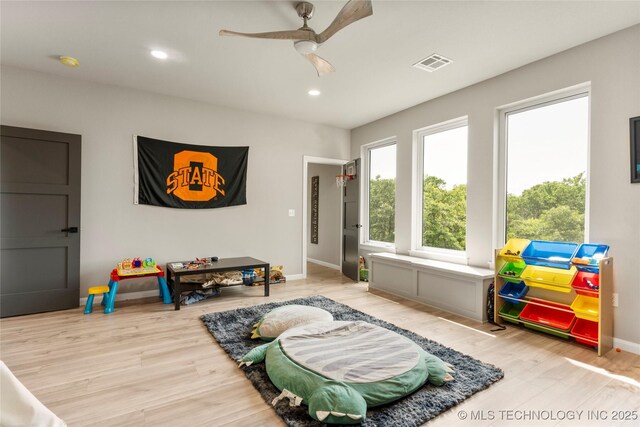 8562 Adams Creek Rd, Beggs, OK 74421 - rec room with a ceiling fan, wood finished floors, baseboards, and recessed lighting