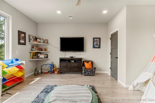 8562 Adams Creek Rd, Beggs, OK 74421 - playroom featuring wood finished floors, recessed lighting, and baseboards