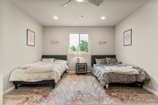 8562 Adams Creek Rd, Beggs, OK 74421 - bedroom with light wood finished floors, baseboards, and recessed lighting