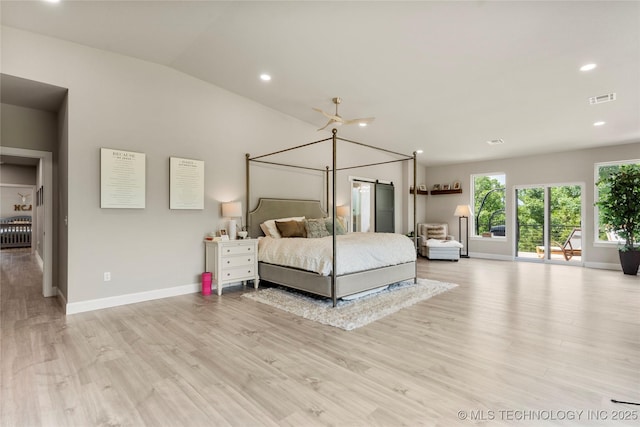 8562 Adams Creek Rd, Beggs, OK 74421 - bedroom featuring baseboards, light wood-type flooring, access to exterior, recessed lighting, and lofted ceiling
