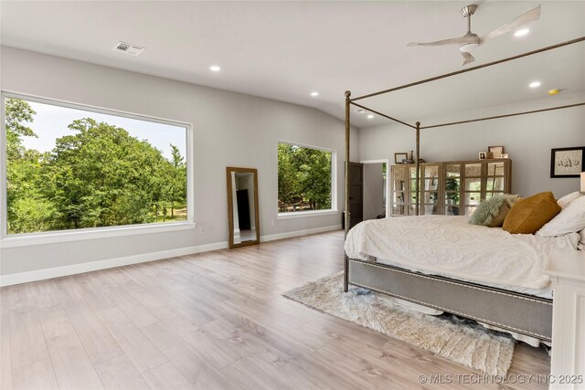 8562 Adams Creek Rd, Beggs, OK 74421 - bedroom with recessed lighting, wood finished floors, baseboards, and lofted ceiling