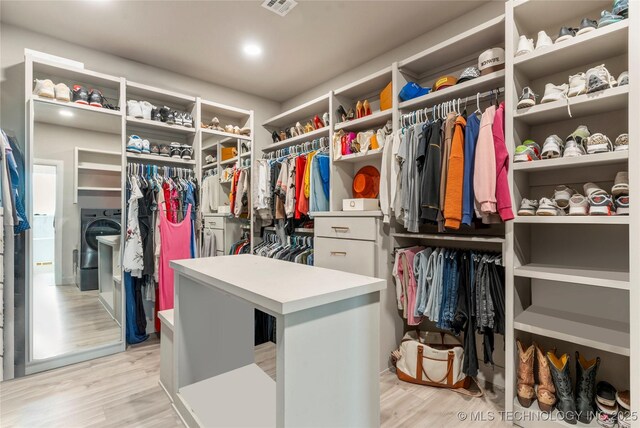 8562 Adams Creek Rd, Beggs, OK 74421 - spacious closet featuring light wood-type flooring