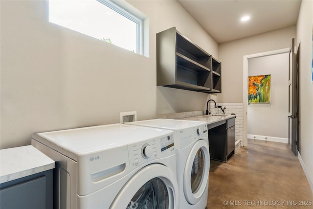 8562 Adams Creek Rd, Beggs, OK 74421 - laundry room featuring separate washer and dryer, recessed lighting, and baseboards