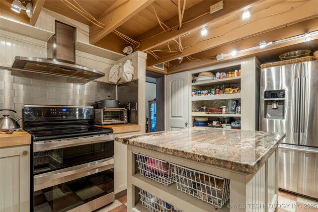 168 Murray Ln, Strang, OK 74367 - kitchen featuring stainless steel appliances, wall chimney range hood, backsplash, open shelves, and a center island
