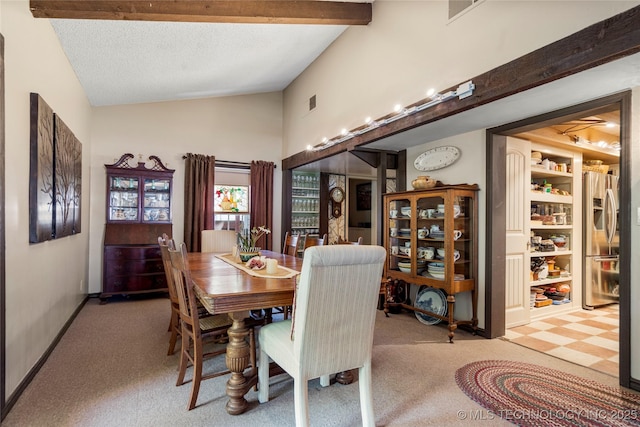 168 Murray Ln, Strang, OK 74367 - dining space featuring light colored carpet and high vaulted ceiling