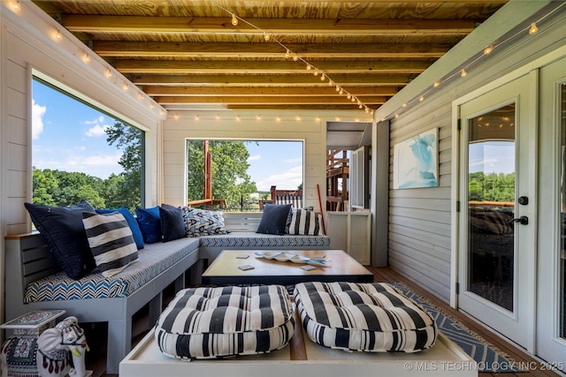 168 Murray Ln, Strang, OK 74367 - sunroom / solarium with wooden ceiling with exposed beams, wood finished floors, and wood walls