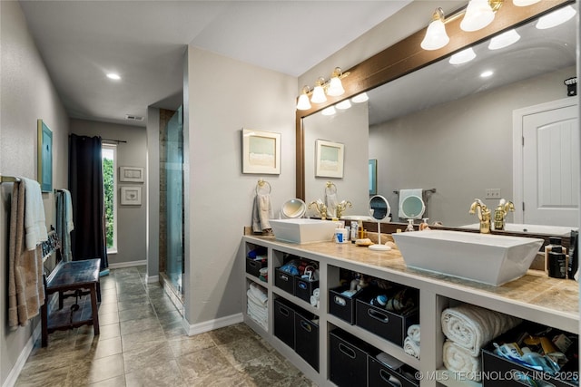 168 Murray Ln, Strang, OK 74367 - bathroom featuring baseboards, double vanity, a shower with door, and recessed lighting