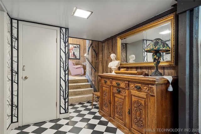 168 Murray Ln, Strang, OK 74367 - foyer entrance featuring dark floors, wood walls, and stairway