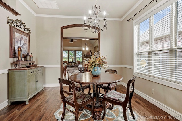 3501 W Gary St S, Broken Arrow, OK 74012 - dining area with wood finished floors, a chandelier, crown molding, arched walkways, and a ceiling fan