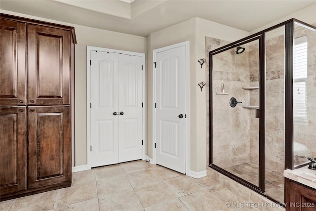 3501 W Gary St S, Broken Arrow, OK 74012 - full bathroom with a stall shower, a closet, and vanity