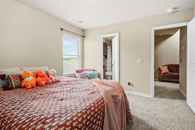 3501 W Gary St S, Broken Arrow, OK 74012 - carpeted bedroom with baseboards and connected bathroom