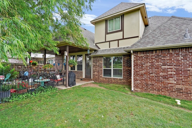 3501 W Gary St S, Broken Arrow, OK 74012 - rear view of property featuring roof with shingles, brick siding, a patio area, and stucco siding