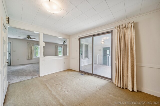 915 N Boudinot Ave, Dewey, OK 74029 - empty room featuring carpet and a ceiling fan