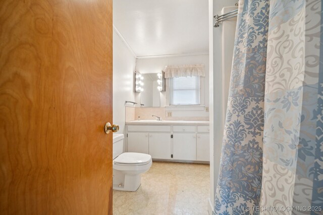 915 N Boudinot Ave, Dewey, OK 74029 - bathroom featuring toilet, ornamental molding, vanity, tile patterned floors, and a shower with shower curtain