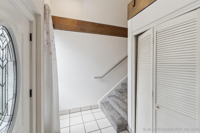 410 W 7th St Unit 241, Tulsa, OK 74119 - foyer entrance with light tile patterned floors and stairway