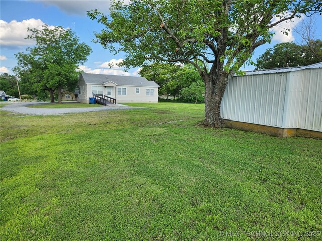 307 N W St, Mcalester, OK 74501 - view of green lawn