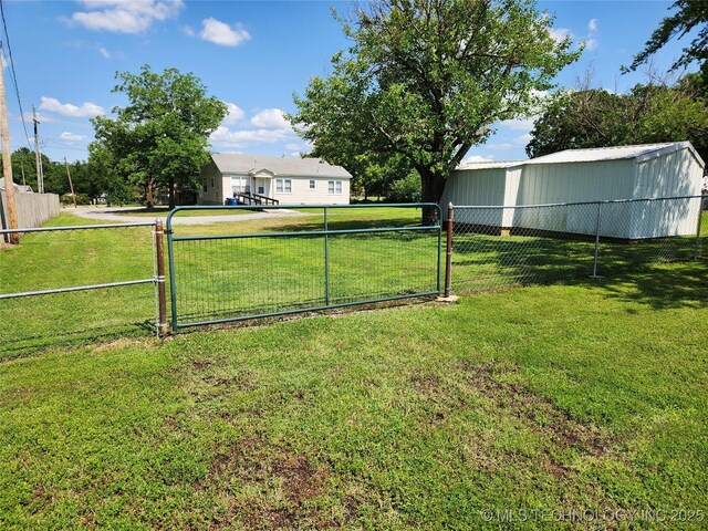 307 N W St, Mcalester, OK 74501 - view of yard with a gate