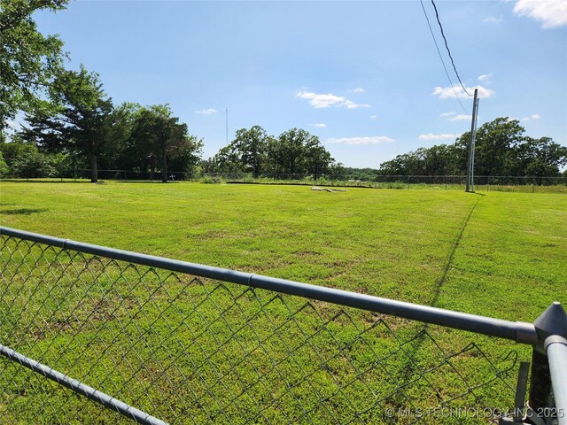 307 N W St, Mcalester, OK 74501 - view of yard with a view of countryside
