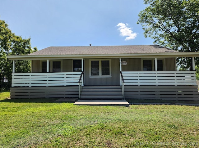 307 N W St, Mcalester, OK 74501 - view of front of property featuring a front yard and a porch