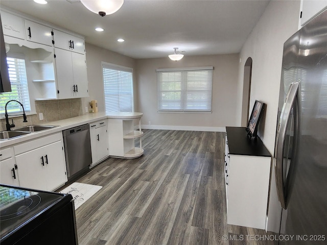 307 N W St, Mcalester, OK 74501 - kitchen featuring open shelves, stainless steel appliances, a sink, dark wood-style flooring, and recessed lighting