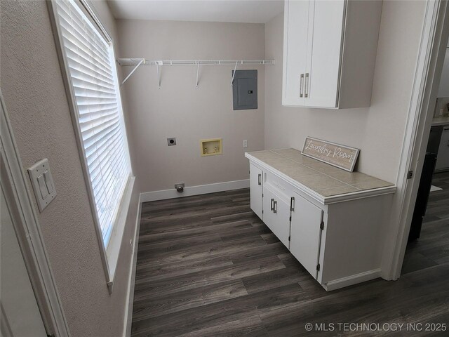 307 N W St, Mcalester, OK 74501 - laundry area with washer hookup, electric panel, dark wood-style flooring, and hookup for an electric dryer