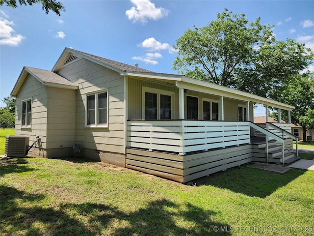 307 N W St, Mcalester, OK 74501 - view of home's exterior with central AC, a yard, and crawl space