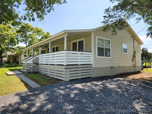 307 N W St, Mcalester, OK 74501 - view of front of house with crawl space and covered porch