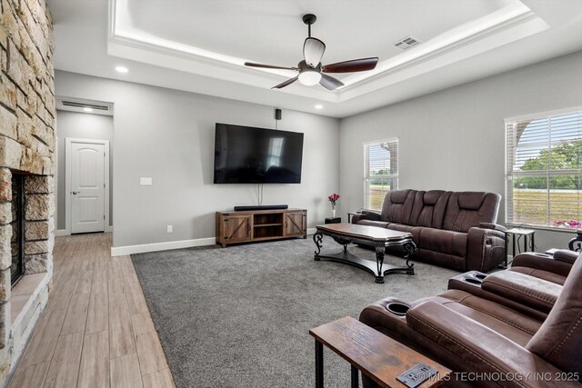 30185 N 3994th Dr, Ramona, OK 74061 - living room with a raised ceiling, ceiling fan, recessed lighting, crown molding, and light wood-style flooring