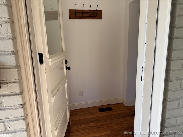 2109 Delaware St, Muskogee, OK 74403 - detailed view of wood finished floors and baseboards