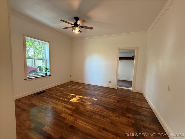 2109 Delaware St, Muskogee, OK 74403 - empty room with dark wood-type flooring, crown molding, a ceiling fan, and baseboards