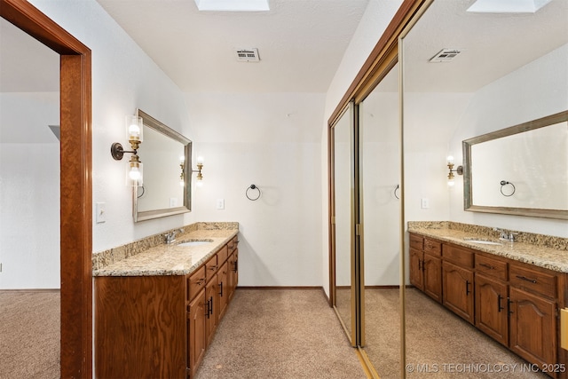 3508 Kimberlea, Muskogee, OK 74403 - bathroom featuring two vanities and baseboards
