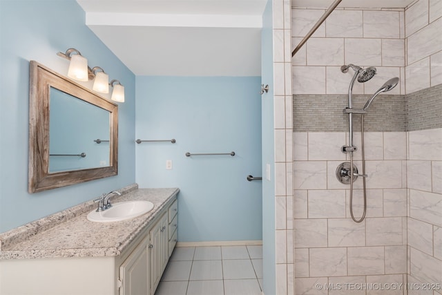 3508 Kimberlea, Muskogee, OK 74403 - bathroom with vanity, tiled shower, tile patterned floors, and baseboards