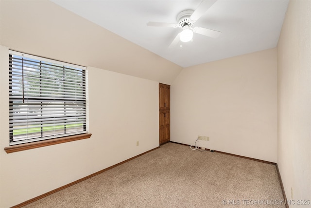 3508 Kimberlea, Muskogee, OK 74403 - unfurnished room featuring light carpet, healthy amount of natural light, ceiling fan, baseboards, and vaulted ceiling