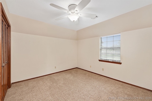 3508 Kimberlea, Muskogee, OK 74403 - unfurnished bedroom with light carpet, a closet, baseboards, and a ceiling fan