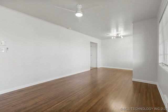 6210 E 17th St, Tulsa, OK 74112 - empty room with dark wood-style floors, baseboards, ceiling fan, and crown molding