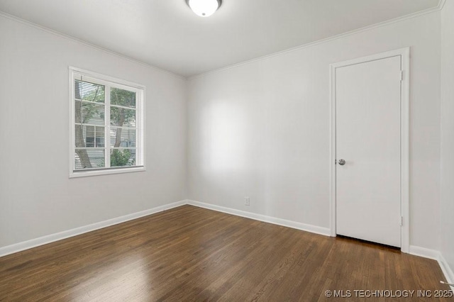 6210 E 17th St, Tulsa, OK 74112 - unfurnished room with wood finished floors, crown molding, and baseboards