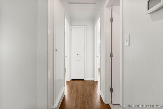 6210 E 17th St, Tulsa, OK 74112 - hallway with dark wood-style floors and baseboards