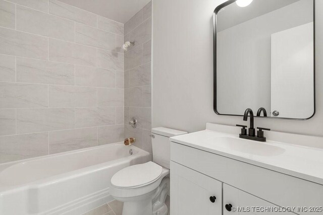 6210 E 17th St, Tulsa, OK 74112 - bathroom with vanity, toilet, and  shower combination
