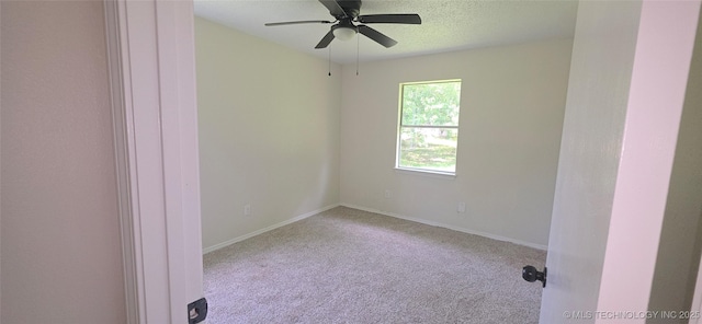 1405 S Cedar St, Bristow, OK 74010 - unfurnished room with carpet floors, ceiling fan, and baseboards