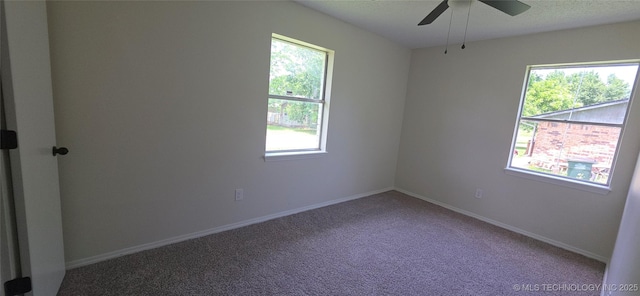 1405 S Cedar St, Bristow, OK 74010 - carpeted empty room with a ceiling fan and baseboards