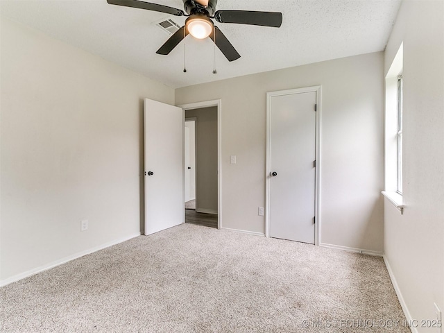 1405 S Cedar St, Bristow, OK 74010 - unfurnished bedroom with carpet flooring and a ceiling fan