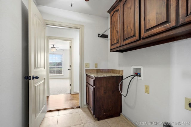 400 E Fargo St, Broken Arrow, OK 74012 - washroom with cabinet space, ceiling fan, electric dryer hookup, light tile patterned flooring, and washer hookup