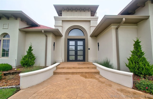 3704 River Bend Rd, Muskogee, OK 74403 - entrance to property featuring french doors and stucco siding