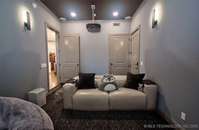 3704 River Bend Rd, Muskogee, OK 74403 - cinema room with crown molding, baseboards, and carpet