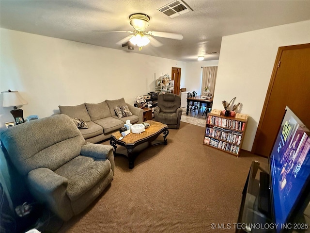 32807 S 250th Rd, Henryetta, OK 74437 - living room with ceiling fan and carpet floors