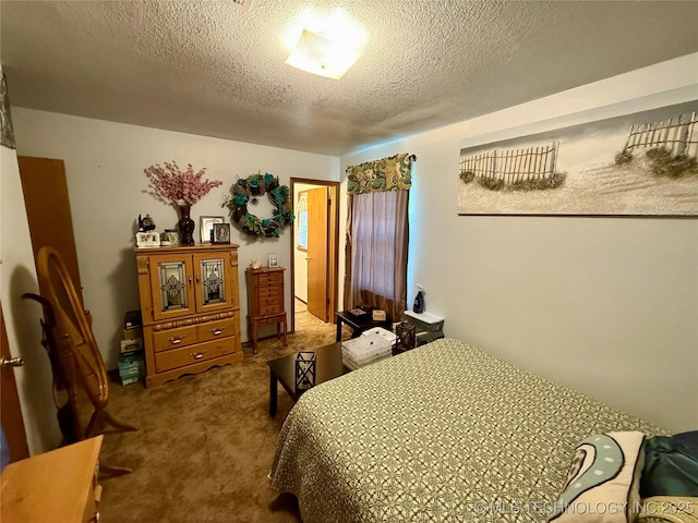 32807 S 250th Rd, Henryetta, OK 74437 - carpeted bedroom featuring a textured ceiling