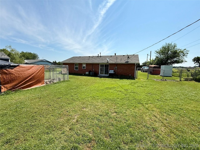 32807 S 250th Rd, Henryetta, OK 74437 - back of property featuring a gate and brick siding