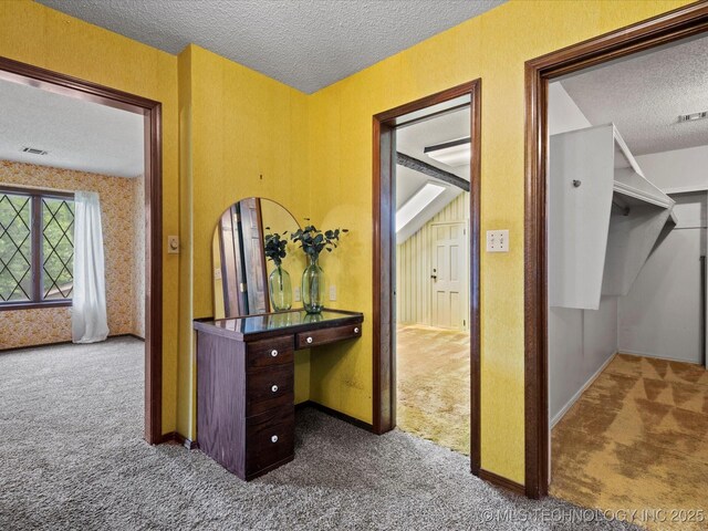 639 Oakridge Dr, Bartlesville, OK 74006 - hallway featuring carpet flooring and a textured ceiling